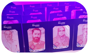 Guest using Text Selfie Photo Booth at an event in Dubai, receiving a printed word cloud image made from their photo with custom branded text for marketing activation